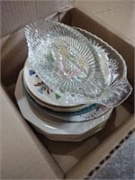 Lot of mixed glass dishes including dinner plates