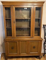China cabinet with glass door, two shelves. Two
