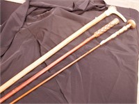 Two vintage umbrella handles with shafts as-is,