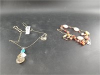 2 pieces of fashion jewelry including 1 featuring