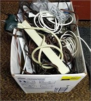 Box lot of cords, power strips, and more