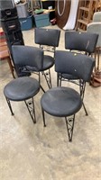 Set of Four Black Metal Chairs

(There is a few