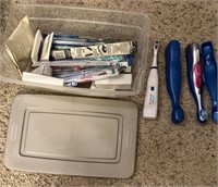 small tote with brand new toothbrushes