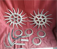 2 rotary hoes, 3 hand scythes and planter plates