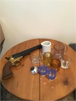 TWO GLASS TOOTHPICK HOLDERS, CERAMIC GUN