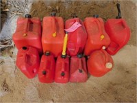 10 plastic gas cans w/ air openings 1 - 5 gal