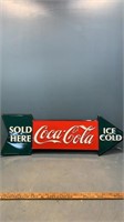 Sold here Coca Cola and a Coca Cola clock