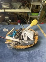 Basket full of kitchen utensils tools