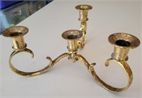 Brass candle holder. 10" across. 5" tall