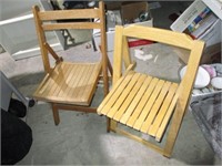 wooden folding chairs .