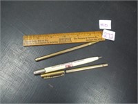 vintage ruler and pens .