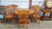 Round oak table(4 ft.) w/ 5 chairs