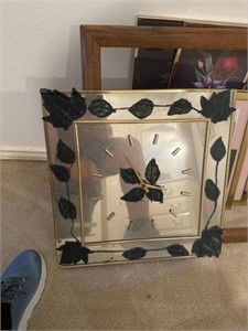 Clock, Frame and pictures  and ironing board