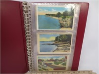 Post card album with 48 early postcards