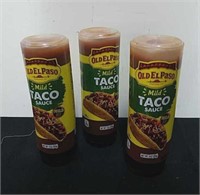 Three bottles of Old El Paso mild taco sauce