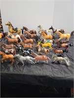 24 MISC TOY HORSES