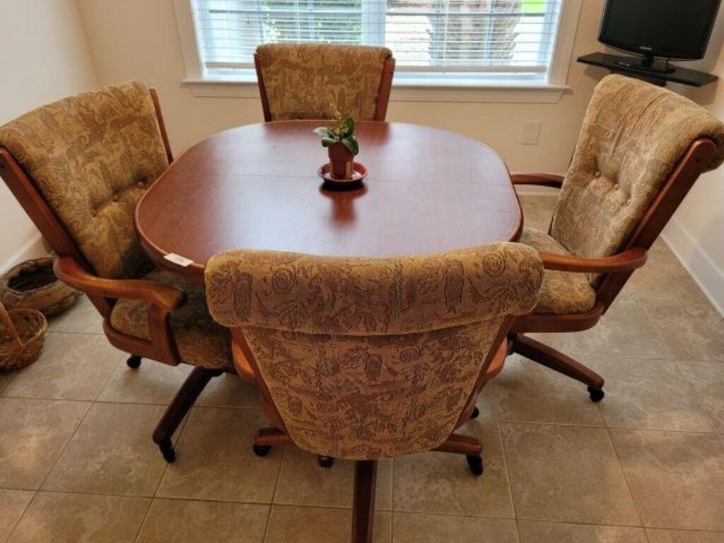 TABLE AND 4 CASTERED CHAIRS
