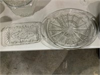 two cut glass trays