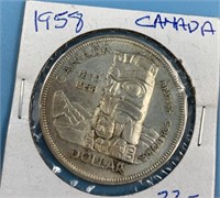 Canadian silver dollar 1958                   (O 1