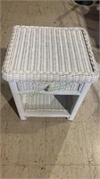 Small white wicker side table with one pull out