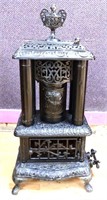 Vintage cast iron parlor stove