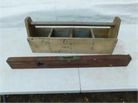 Antique wooden level and homemade tool box.