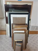 Stack of Picture Frames and Assorted Art