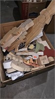 Box of wood decor and craft cutouts