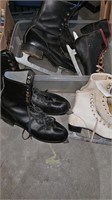 4 pair of ice skates