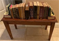 D - SMALL TABLE, BOOKS, BOOKENDS, ANTIQUE IRON