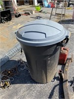 Trash can, hitch and gas can