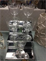 Set of five etched wine glasses