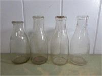 (4) One Quart Milk Bottles