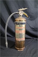 Old brass plated fire extinguisher