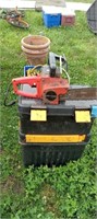 Rolling tool box and chainsaw