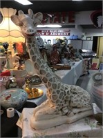 Composite giraffe statue