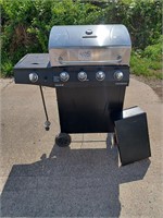 CRARBROIL GRILL WITH A SIDE STOVE.