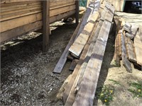 Pile of used 2"x10"  dimension lumber.