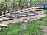 Pile of used 1"x4" barn siding.