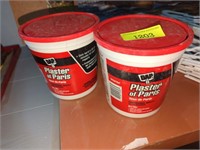 2 containers of dry plaster mix
