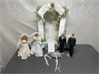 Wedding dolls with homemade arch