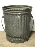 Tall galvanized metal pail with handle