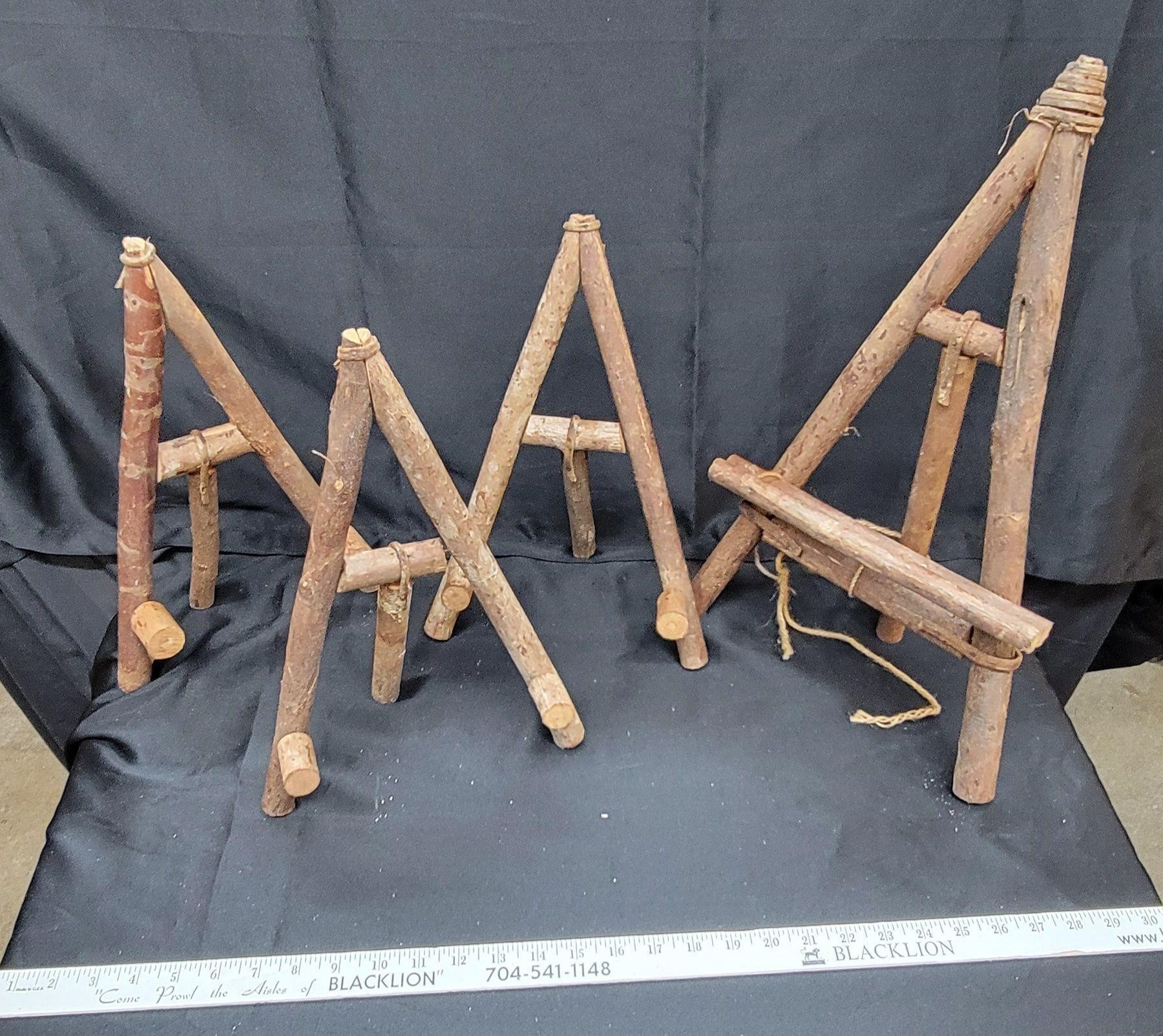 4 wooden easels