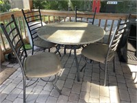 Round tile top table with 4 chairs