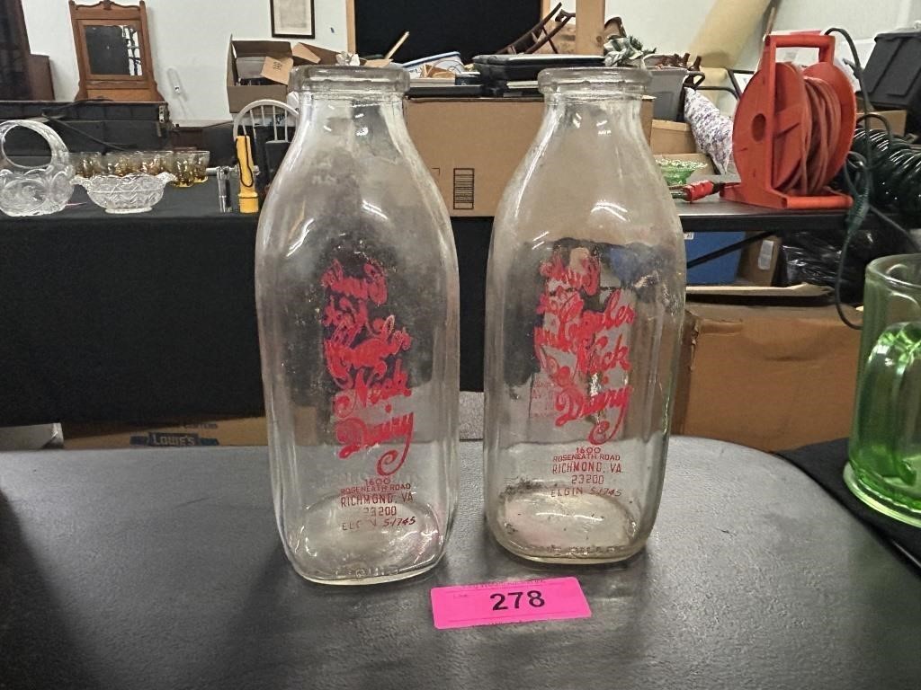Two Curl's Neck Dairy Bottles
