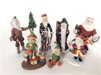 (7) Miniature Cast Santa Claus Figures