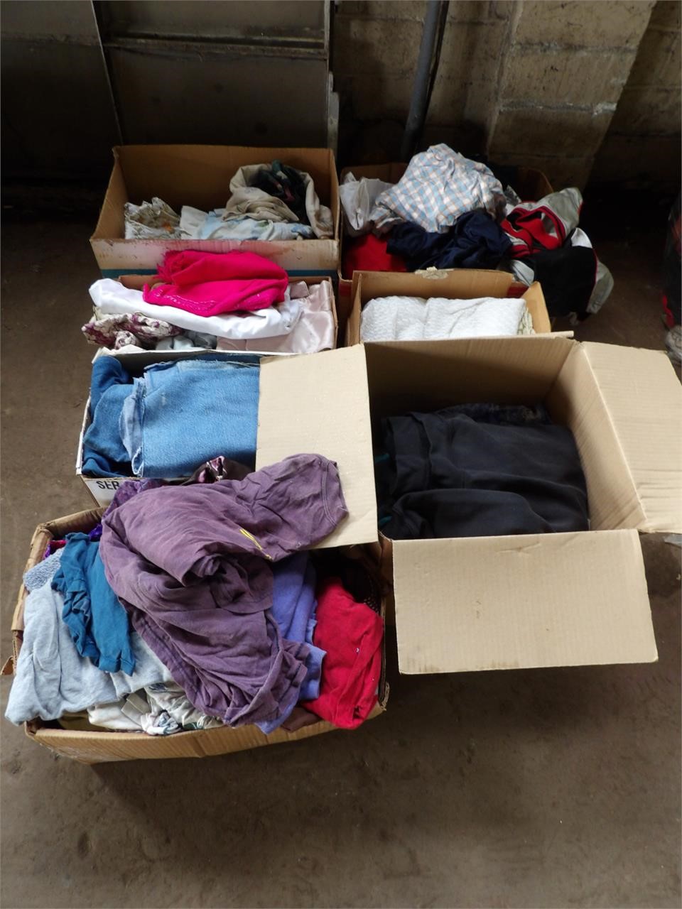 7 Boxes of Clothing, Linens, and More!