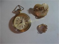 Quartz pocket watch, Charm & pin
