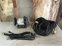 bench grinder, extension cords, rubber bungees