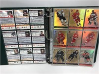 200 hockey cards. In a binder